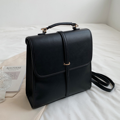 картинка Портфель большой клапан ремень через золотое полу кольцо от магазина LonnaMag