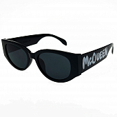 картинка Очки овальной формы срезаны по бокам пластик оправа на дужке надпись Mc Queen от магазина LonnaMag