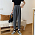 Картинка Брюки высокие бананы с защипами 2 черных пуговицы от магазина LonnaMag