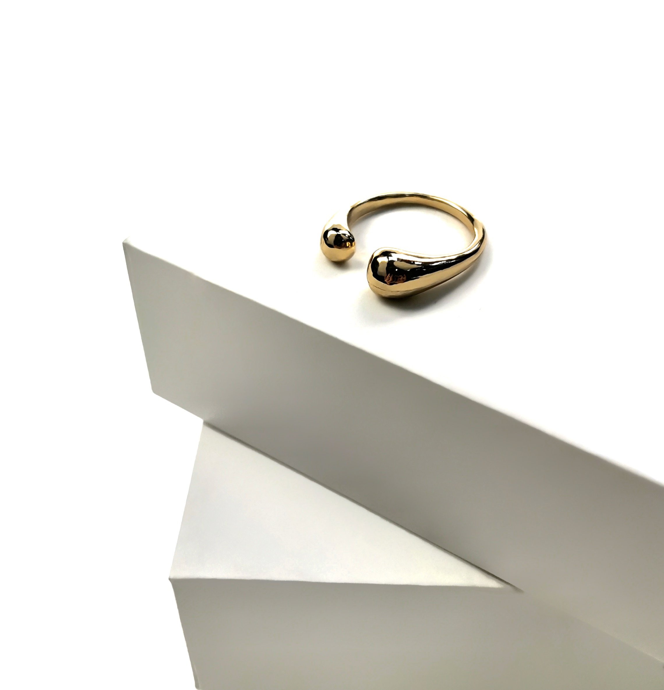 картинка Кольцо разъединенное концы - капли металл от магазина LonnaMag