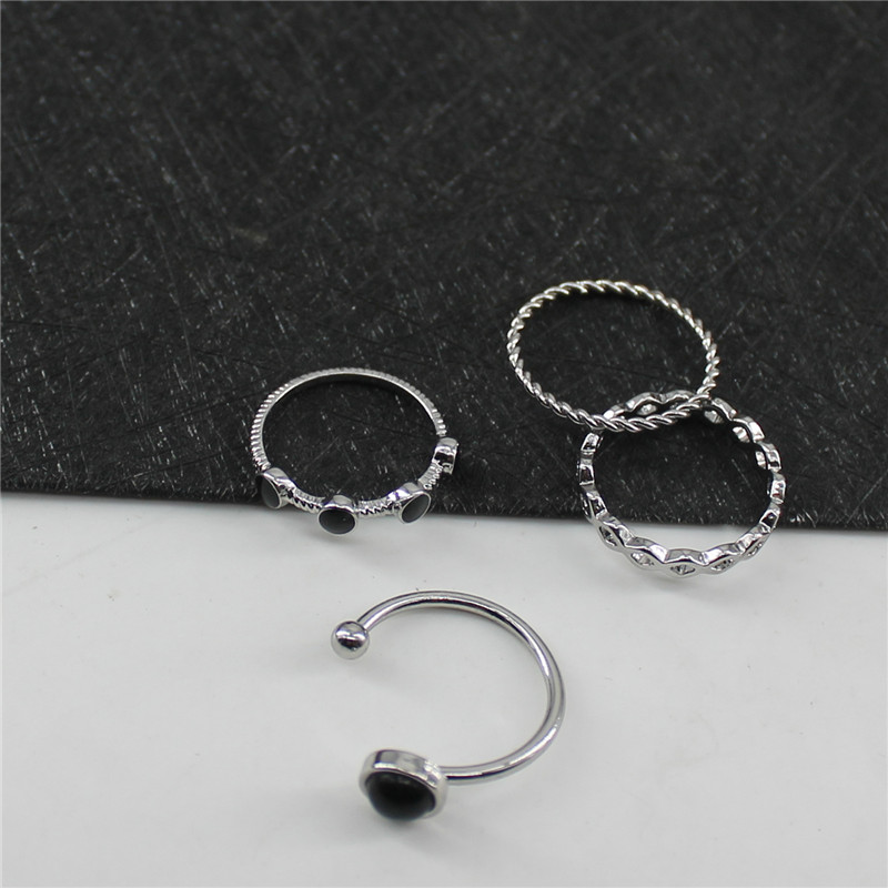 картинка Кольца набор 4 шт закрученное черные камни ромбы от магазина LonnaMag