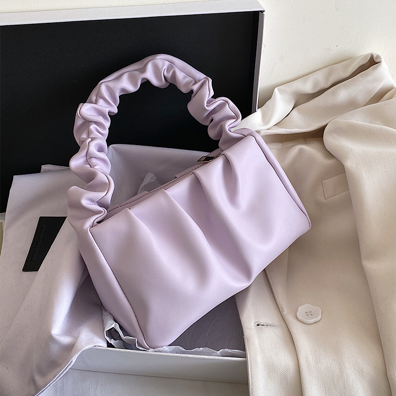 картинка Сумка пухлая ручка на сборке от магазина LonnaMag