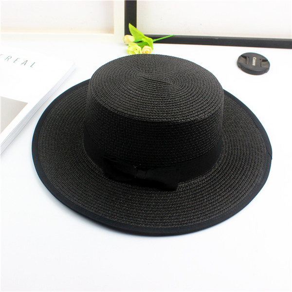 картинка Шляпа соломенная канотье черный кант черная лента с бантом от магазина LonnaMag