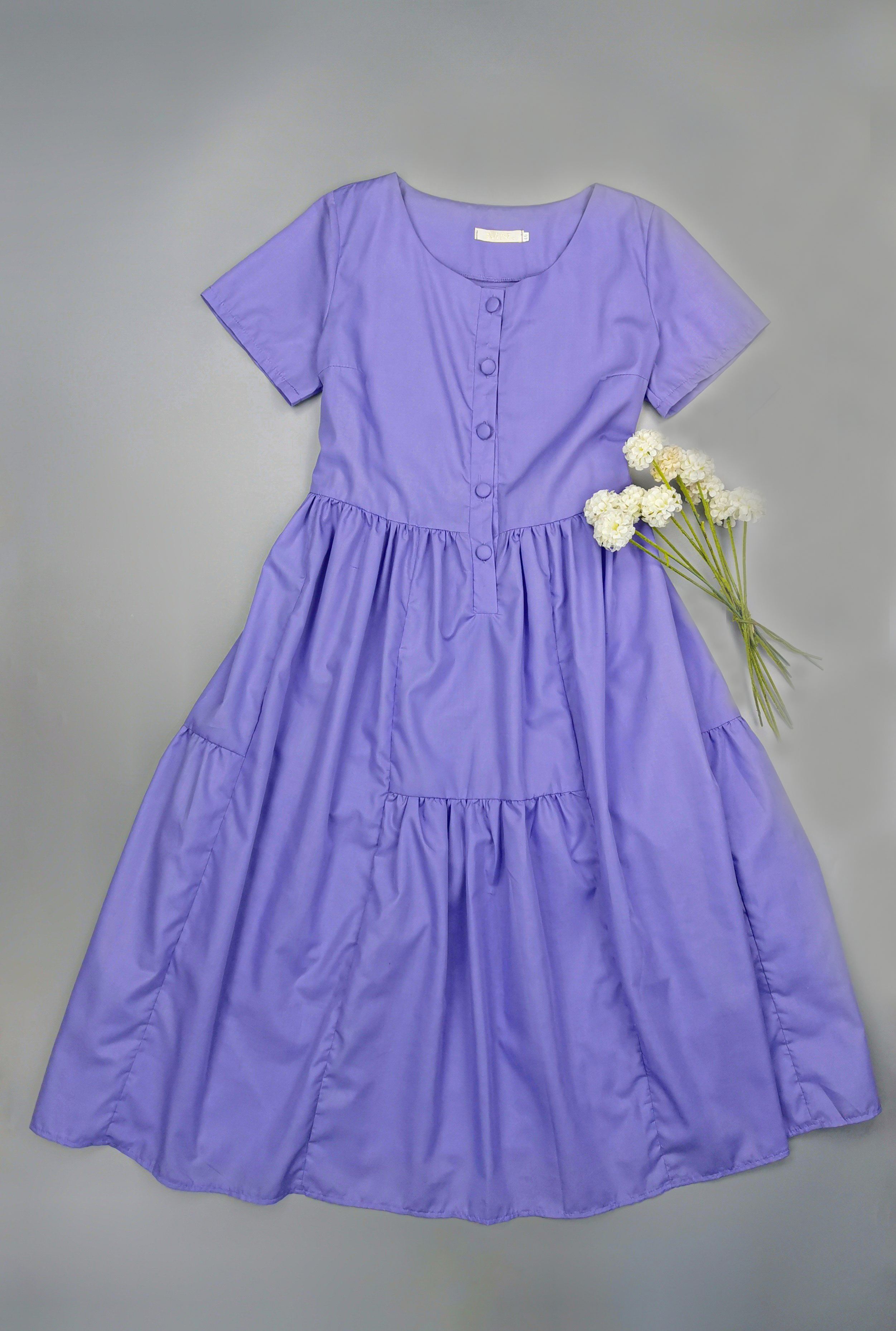 Картинка Платье макси клеш пуговицы на груди из ткани в цвет от магазина LonnaMag