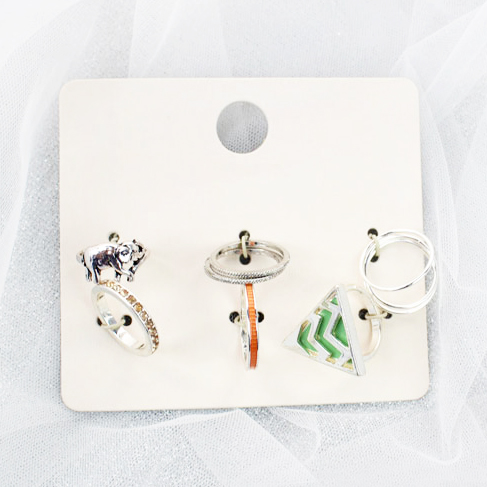 картинка Набор из 6 колец со слоном и зеленым треугольником от магазина LonnaMag