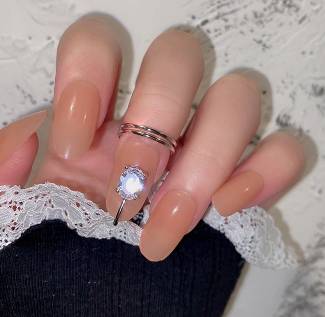 картинка Кольцо на фалангу переходящее на ноготь с овальнм камнем от магазина LonnaMag