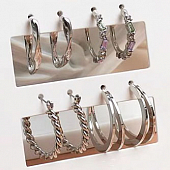 картинка Серьги кольца набор 4 пары неровные стразы закрученные двойные от магазина LonnaMag